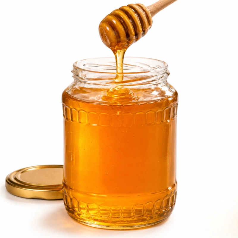 Szklany pojemnik Deco 720 ml z lipowym miodem i łyżką słoik na 1 kg miodu fi 82
