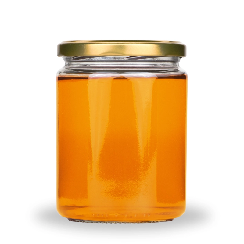 Słój szklany 540 ml Simple wypełniony złocistą konfiturą, pomarańczowy kolor przez bezbarwne szkło, pokrywka fi 82