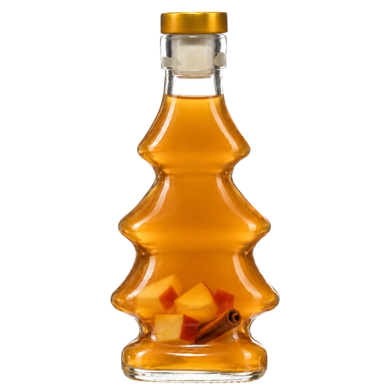Pusta szklana butelka choinka 100 ml na nalewkę z korkiem ze złotą główką, bezbarwne szkło, białe tło